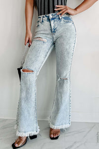 Jean taille haute en denim légèrement délavé, pantalon déchiré à pompons Femme - RAPHYA