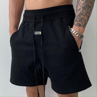 Short de sport ample extensible à fermeture éclair en pur coton Homme - RAPHYA