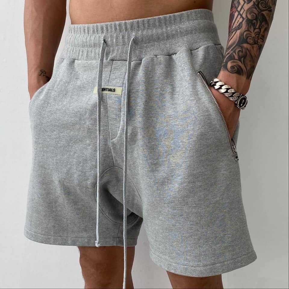 Short de sport ample extensible à fermeture éclair en pur coton Homme - RAPHYA